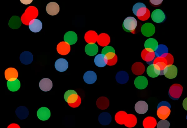 Colorful circle shape boke on dark as background — Stock Photo, Image