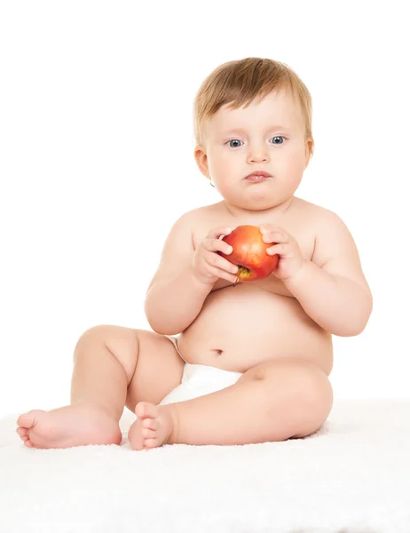 Baby med äpple — Stockfoto