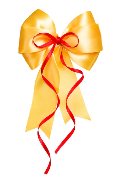Goldene Schleife mit rotem Band aus Seide — Stockfoto
