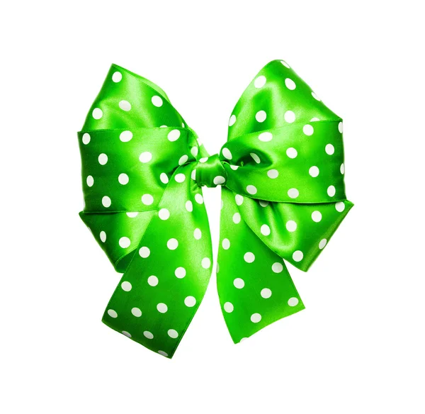 Bright green bow with white polka dots made from silk — Stock Photo, Image