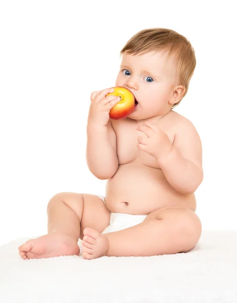 Baby med äpple — Stockfoto