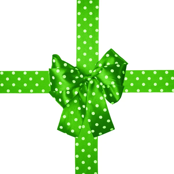 Green bow and ribbon with white polka dots made from silk — Stock Photo, Image