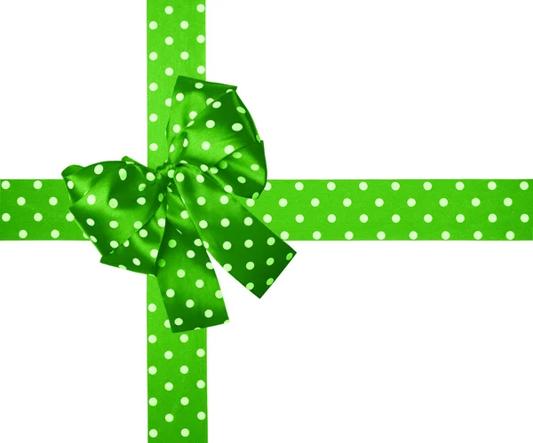 Green bow and ribbon with white polka dots made from silk — Stock Photo, Image