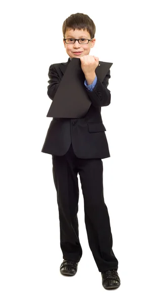 Junge im Anzug zeigen leeres Laken — Stockfoto