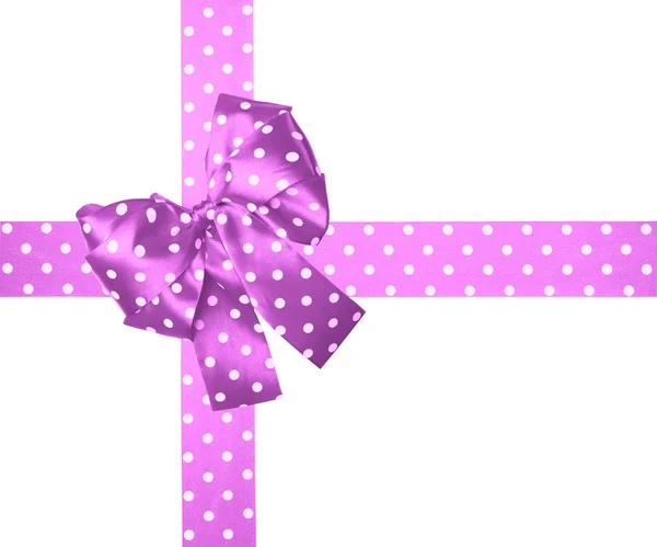 Violet bow and ribbon with white polka dots made from silk — Stock Photo, Image