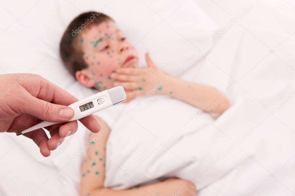 sick boy in bed