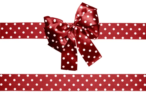 Brown bow and ribbon with white polka dots made from silk — Stock Photo, Image