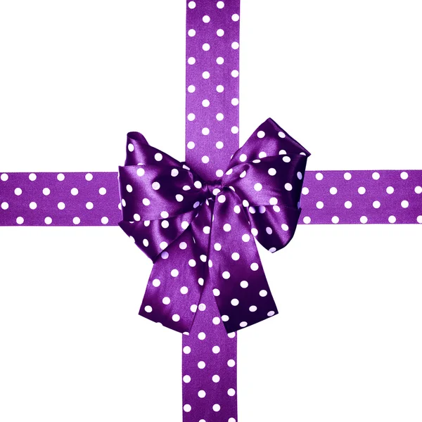 Arco violeta e fita com bolinhas brancas feitas de seda — Fotografia de Stock