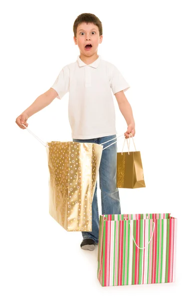 Barn pojke med shopping väska — Stockfoto