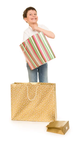 Dítě chlapec s nákupní taškou — Stock fotografie