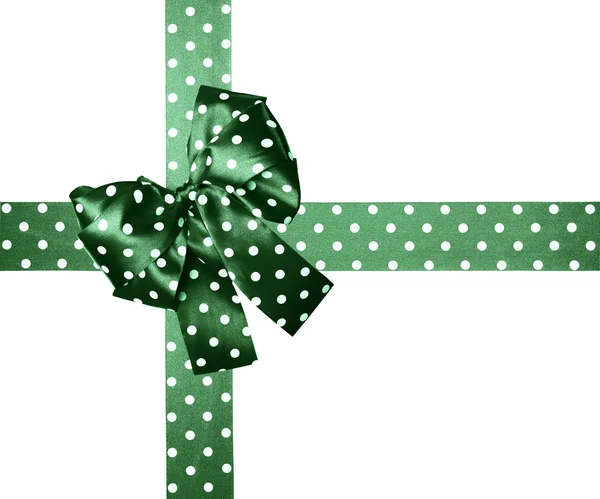 Green bow and ribbon with white polka dots made from silk — Stock Photo, Image