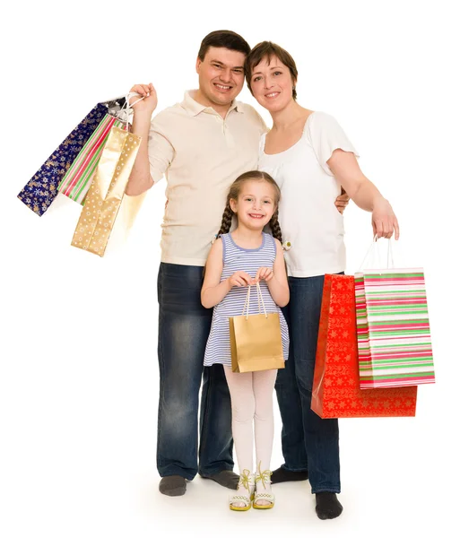 Familia feliz con bolsa de compras —  Fotos de Stock