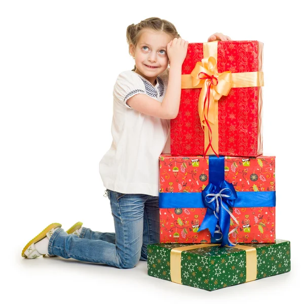 Дівчина з подарунковими коробками — стокове фото