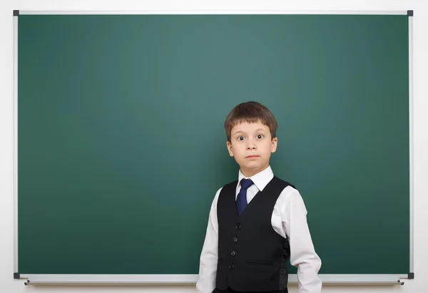 Schoolboy and the school board — Stock Photo, Image