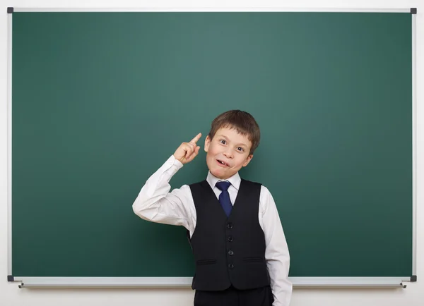 Schoolboy and the school board — Stock Photo, Image