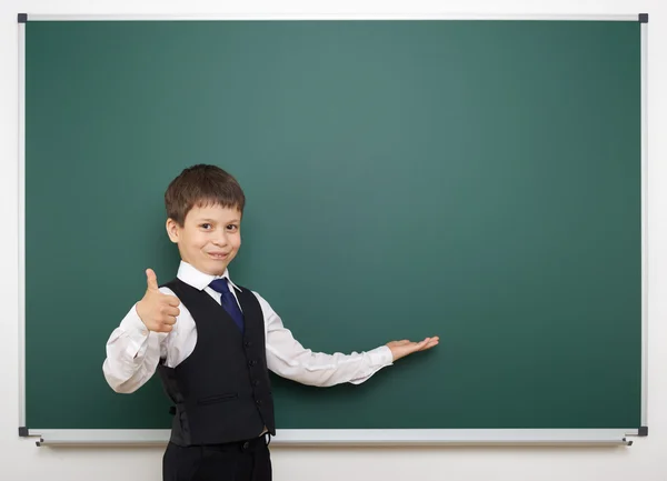 Schoolboy and the school board — Stock Photo, Image