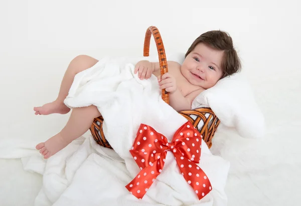 Happy baby in basket on white — Stock Photo, Image