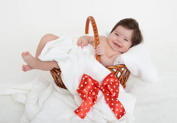 Happy baby in basket on white — Stock Photo, Image