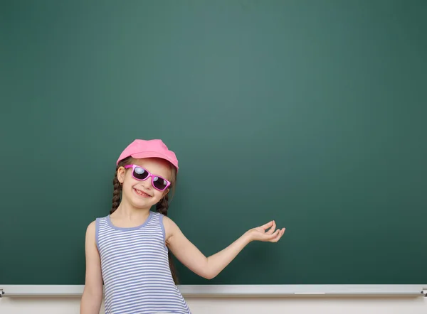 Girl near school board — Stock Photo, Image