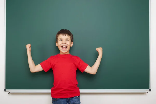 Boy and the school board — Stock Photo, Image