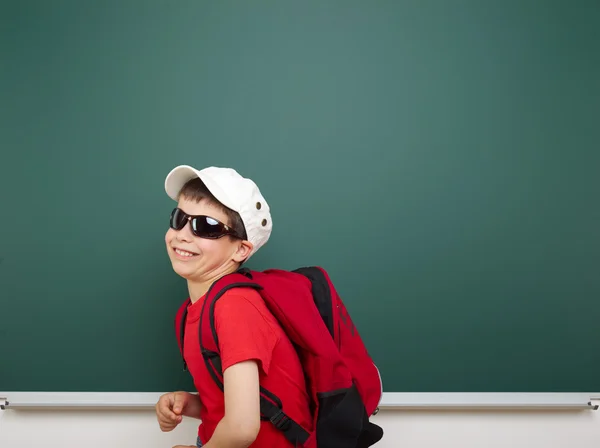 Boy and the school board — Stock Photo, Image