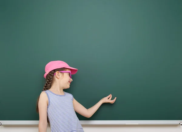 Girl near school board — Stock Photo, Image