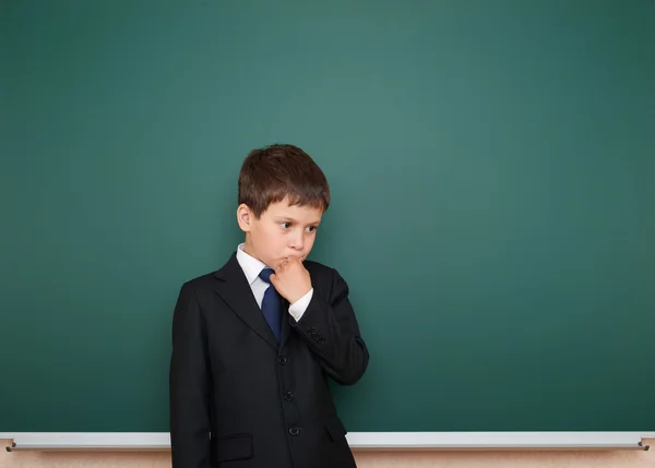 Schooljongen en het schoolbestuur — Stockfoto