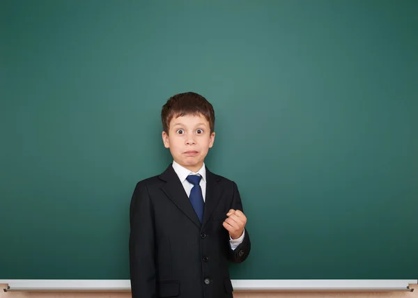 Schooljongen en het schoolbestuur — Stockfoto