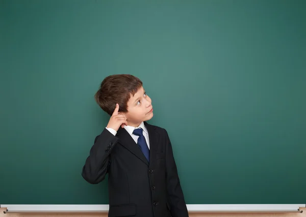 Schoolboy and the school board — Stock Photo, Image