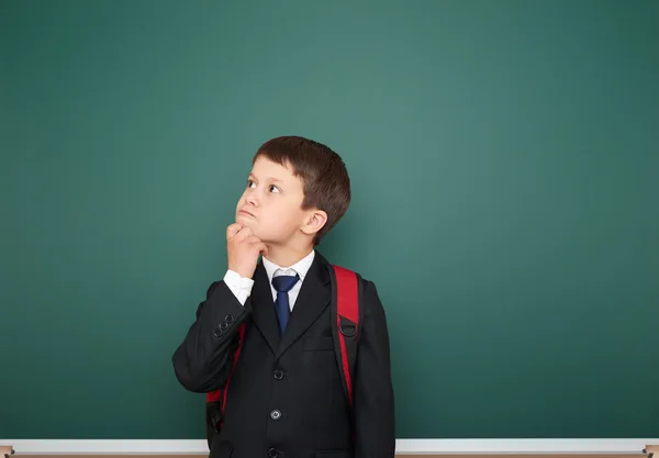 Schoolboy and the school board — Stock Photo, Image