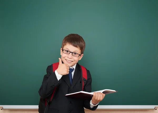 Schoolboy and the school board — Stock Photo, Image