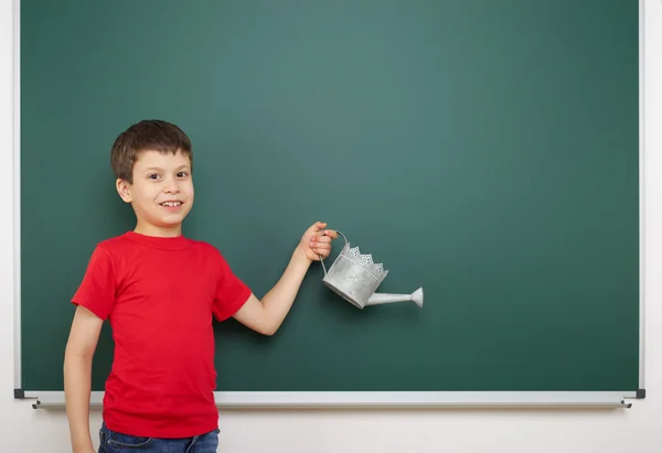 Boy and the school board — Stock Photo, Image