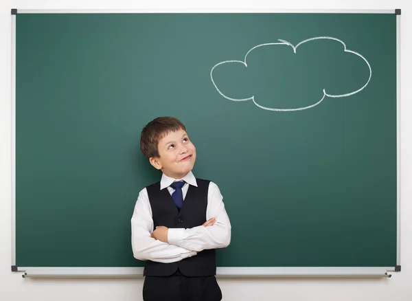 Dreaming boy and painted cloud on board — Stock Photo, Image