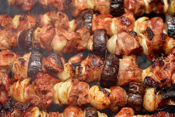 Barbecue from meat and vegetables on fire — Stock Image Barbecue from meat and vegetables on fire Stock Picture