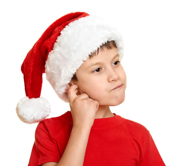 Zimní dovolená vánoční koncepce - boy v santa hat portrét na bílém izolované — Stock fotografie