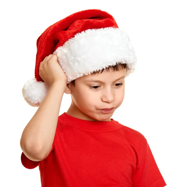 Zimní dovolená vánoční koncepce - boy v santa hat portrét na bílém izolované — Stock fotografie