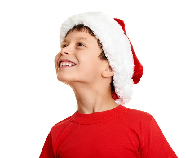 Zimowe wakacje christmas koncepcji - chłopiec w santa hat portret na biały na białym tle — Zdjęcie stockowe