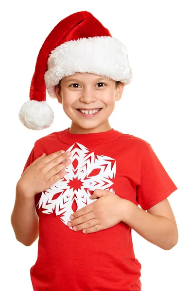 Winter holiday christmas concept - boy in santa hat portrait with big snowflake on white isolated — Φωτογραφία Αρχείου