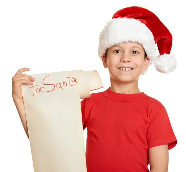 Garçon en chapeau rouge avec une longue lettre de défilement avec des souhaits de Père Noël — Photo