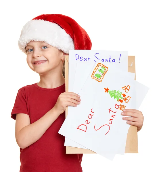Κορίτσι με το κόκκινο καπέλο με επιστολή προς Σάντα - χειμερινών διακοπών Χριστουγέννων έννοια — Φωτογραφία Αρχείου