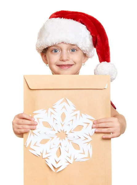 冬の休日のクリスマス コンセプト - サンタさんへの手紙と赤い帽子の少女 — ストック写真