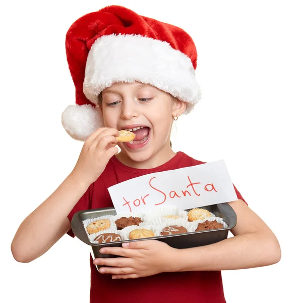 Noel Baba şapkalı kız yemek tanımlama bilgileri - kış tatil Noel kavramı