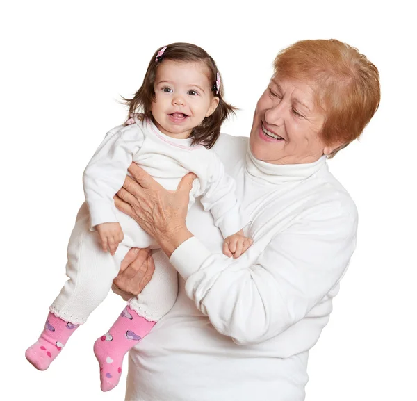 Portrait of baby girl and grandmother on white, happy family concept — Stock Photo, Image