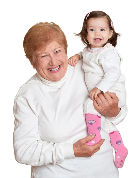 Portrait of baby girl and grandmother on white, happy family concept — Stock Photo, Image