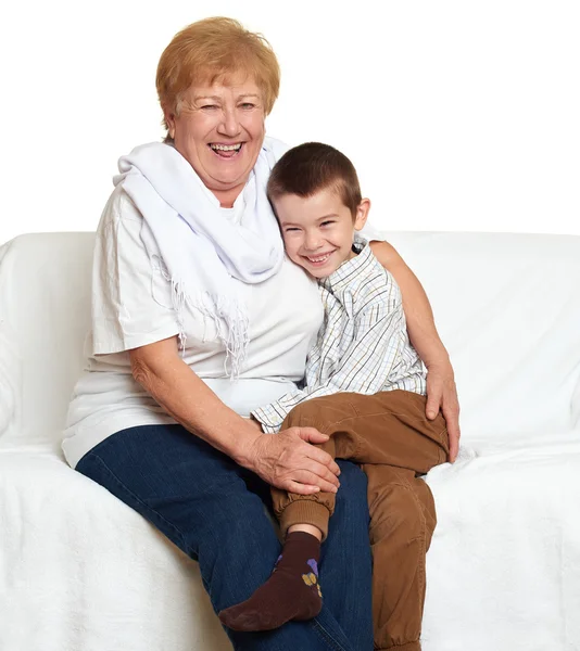 Menino e avó em branco, conceito de família feliz — Fotografia de Stock