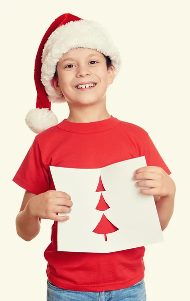Хлопчик у червоній шапці з листом до Санти - зимові канікули різдвяна концепція — стокове фото