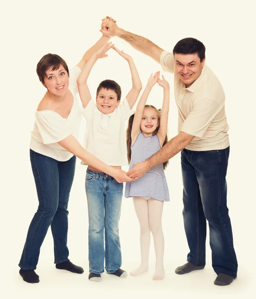 Família feliz no estúdio — Fotografia de Stock