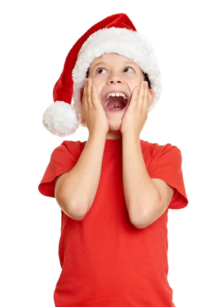 Зимовий різдвяний концепт - хлопчик у портреті капелюха Санта на білому ізольовані — стокове фото