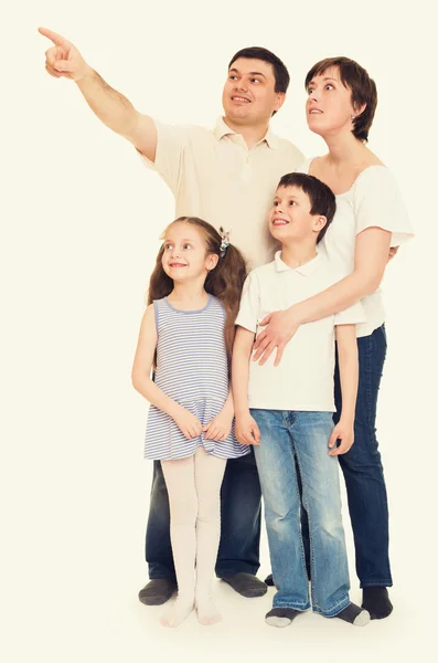 Familia feliz en el estudio — Foto de Stock