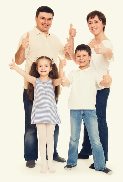 Familia feliz en el estudio — Foto de Stock